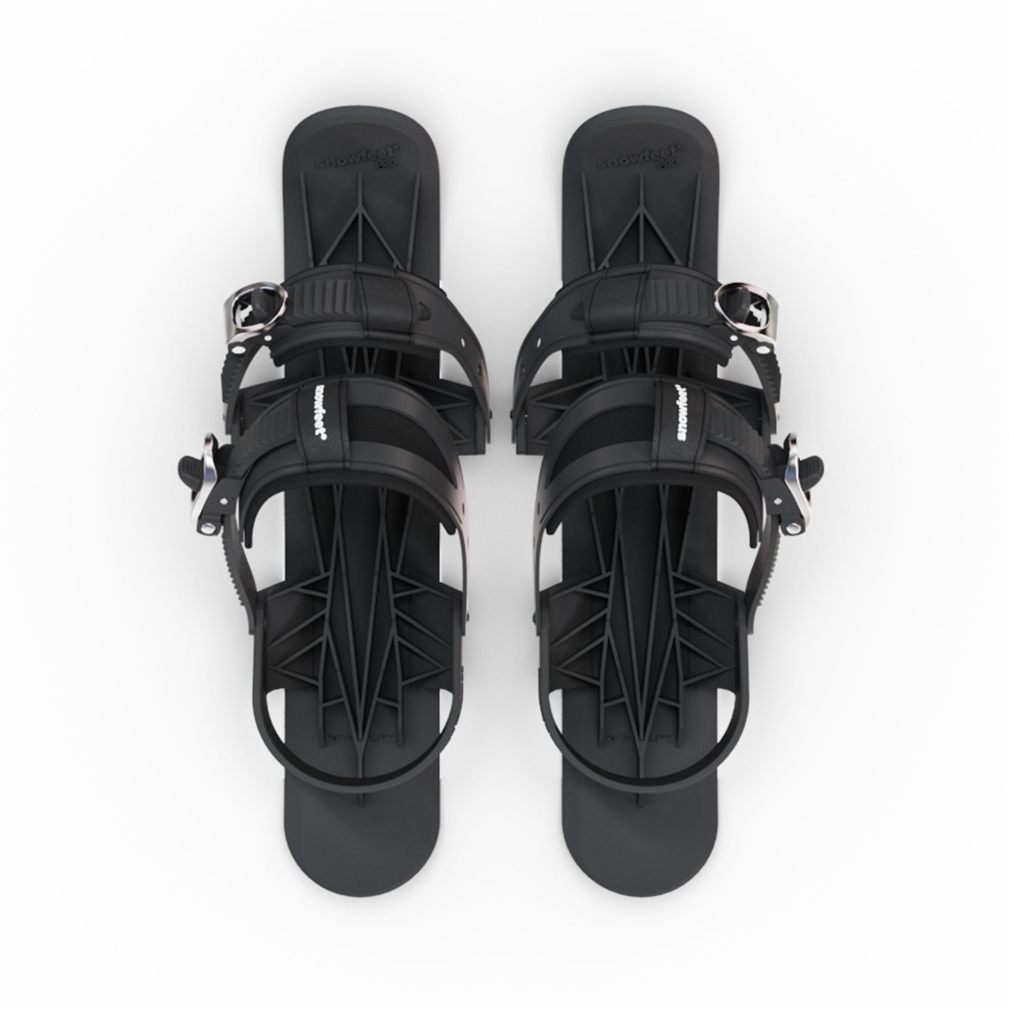 Pair of black sandals with metallic accents on a white background