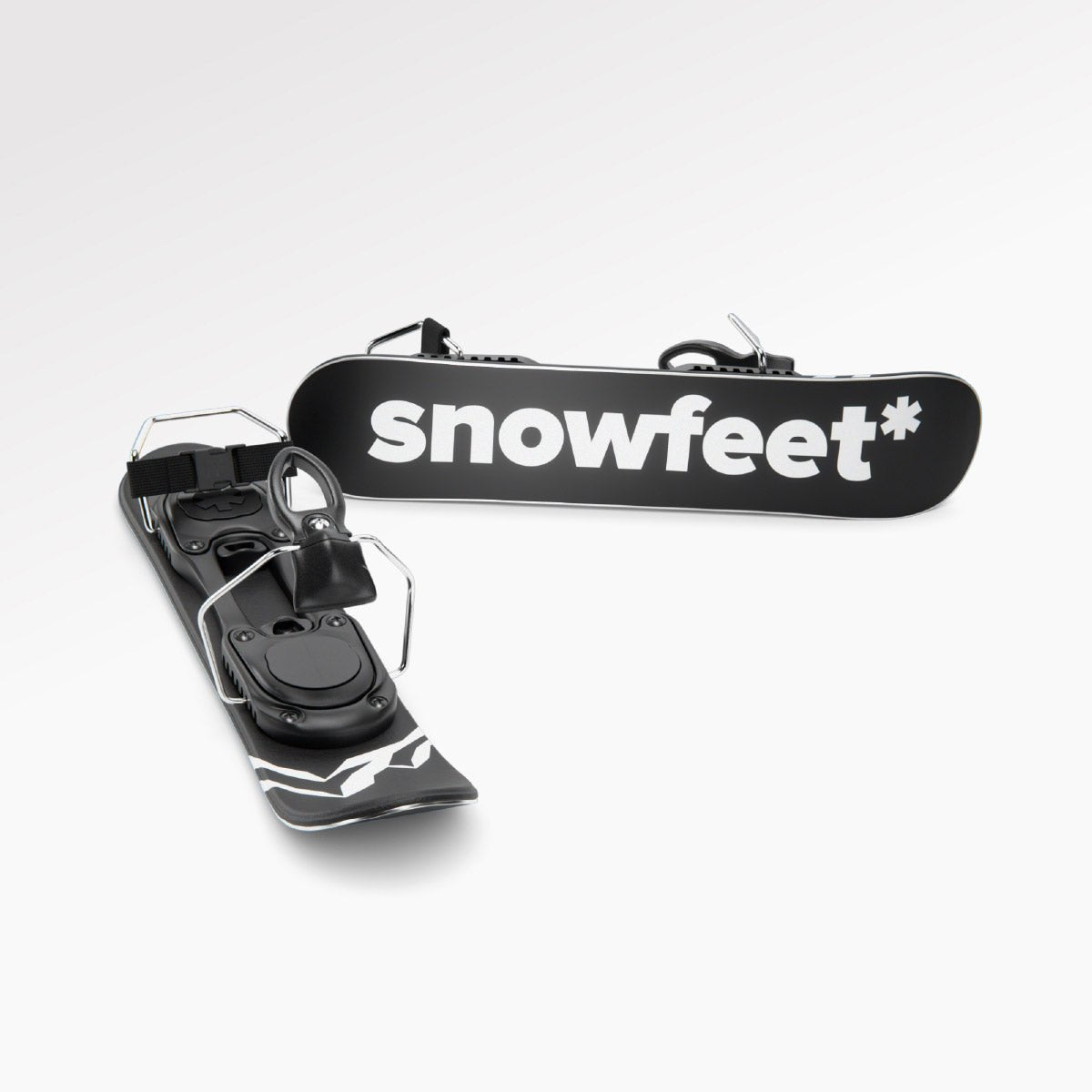 Black short skis with 'snowfeet*' branding on a white background