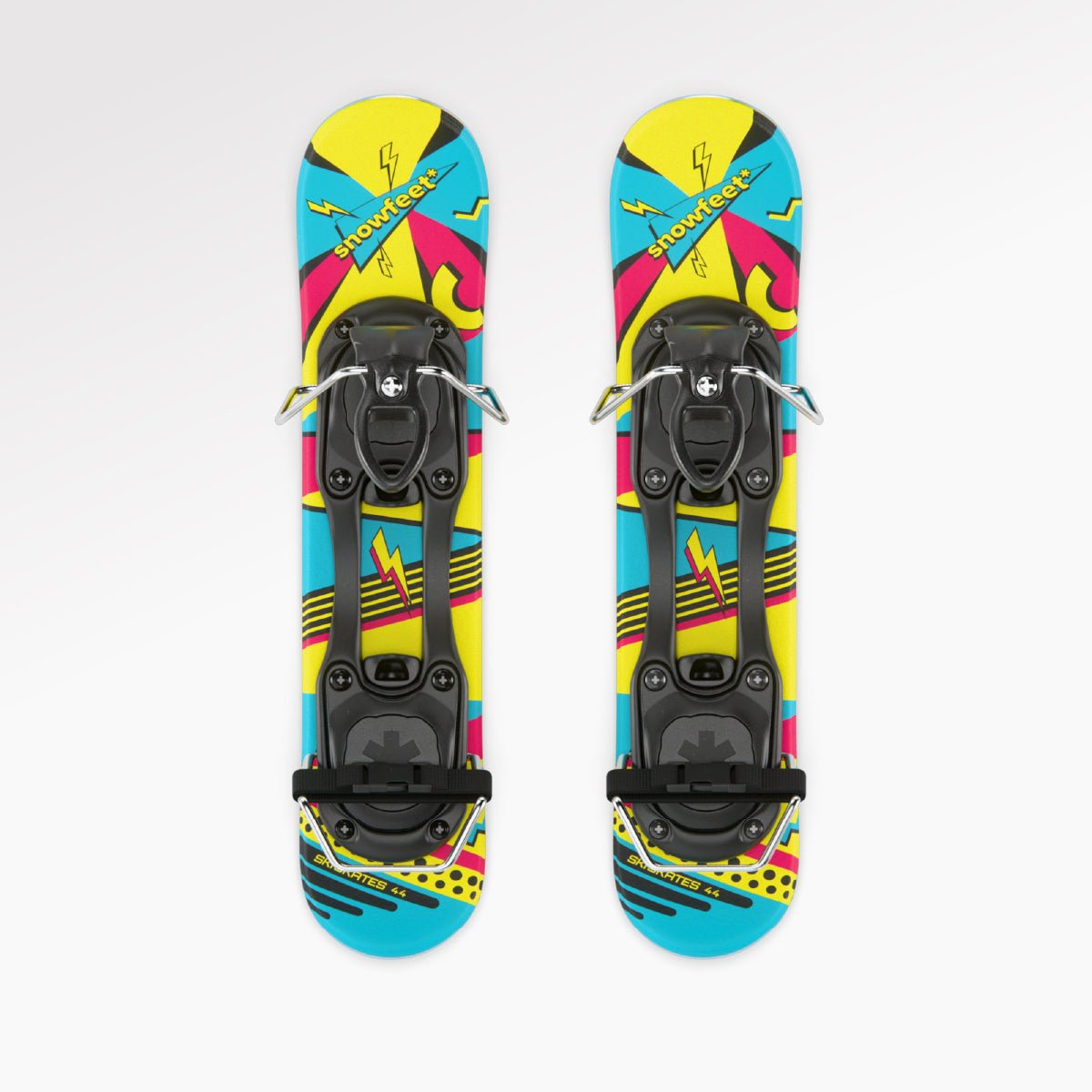 Retro mini skis with bindings on a white background. Ski boot binding