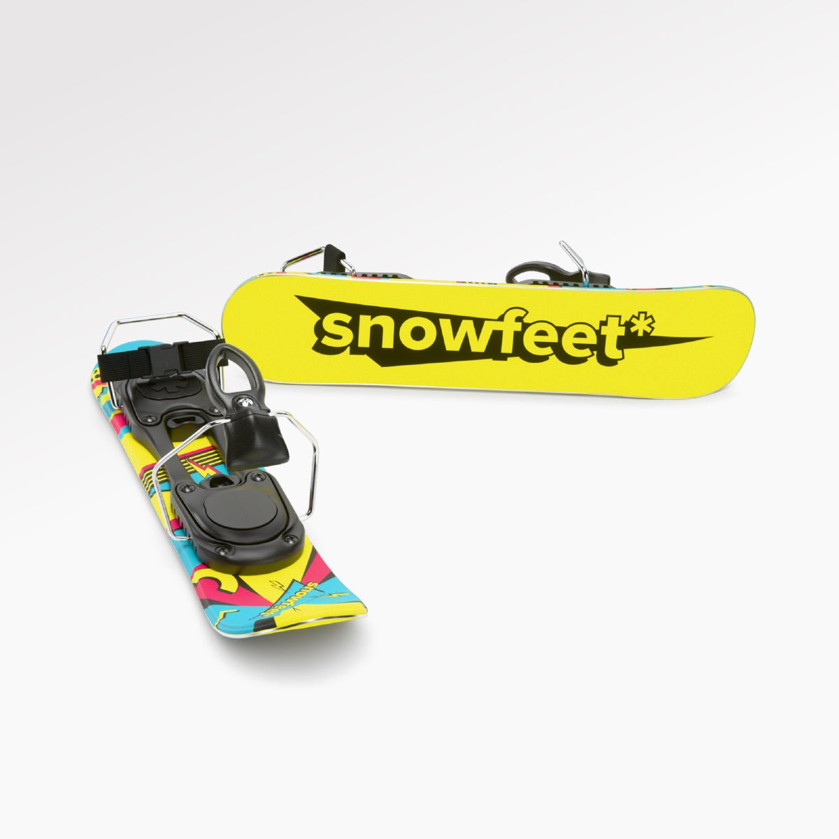 Retro mini skis with bindings on a white background. Ski boot binding