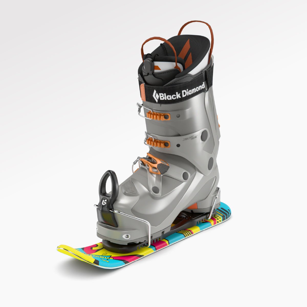 Gray ski boot with colorful binding mini skis on a white background