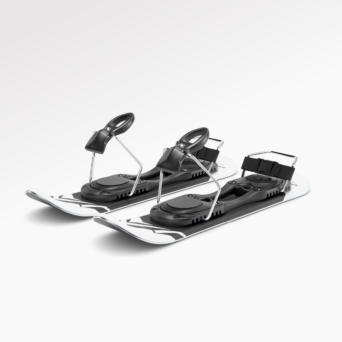 Two short skis with ski boots bindings on a white background