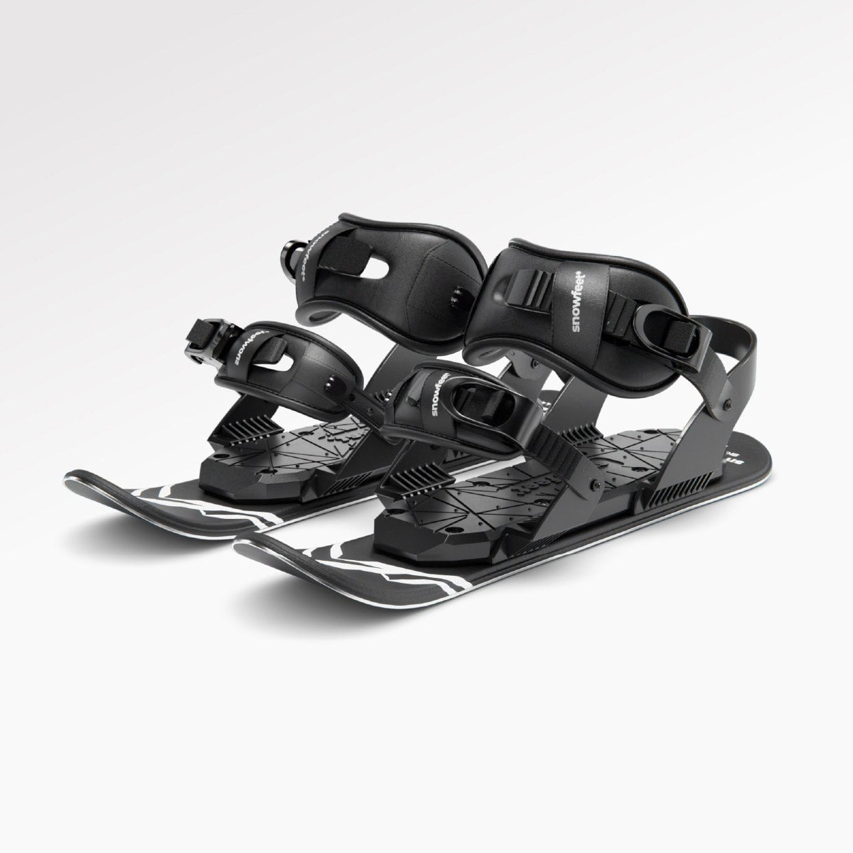 Black snowboard bindings on a white background. Mini skis, snowfeet.