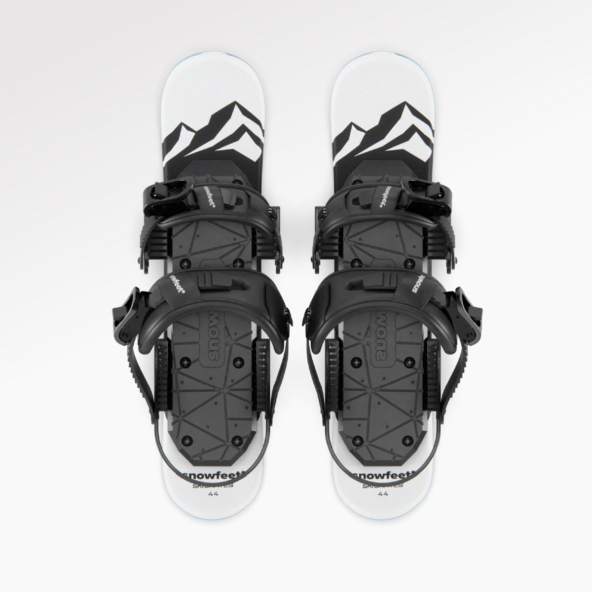 Pair of skiskates with snowboard bindings on a white background